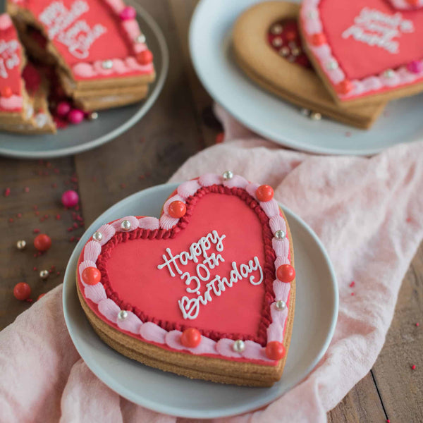 Heart piñata biscuit with personalised message