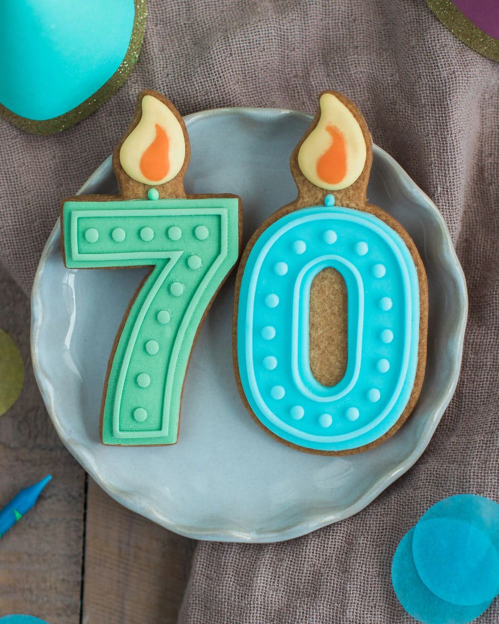 Honeywell Bakes 70th Birthday Biscuits - two celebration candles on a plate
