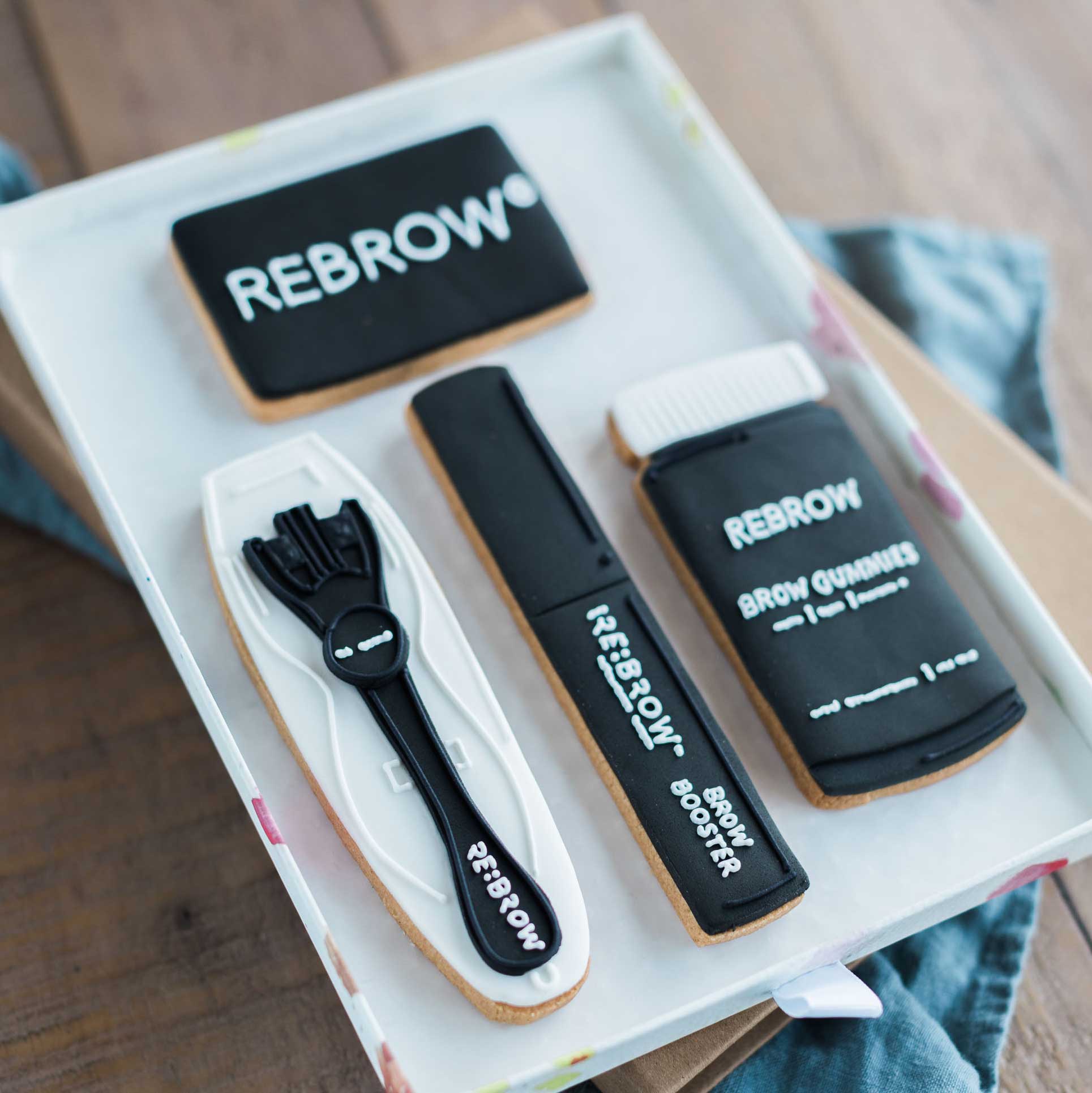 A gift set of branded cosmetic themed cookies for Rebrow, used for PR gifting to influencers