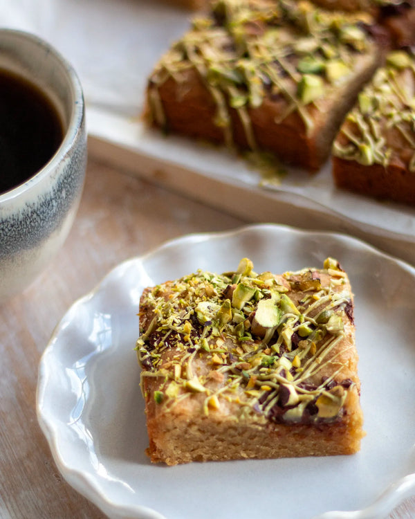 Honeywell Bakes Bakers Club Subscription, A square slice of pistachio-topped blondie