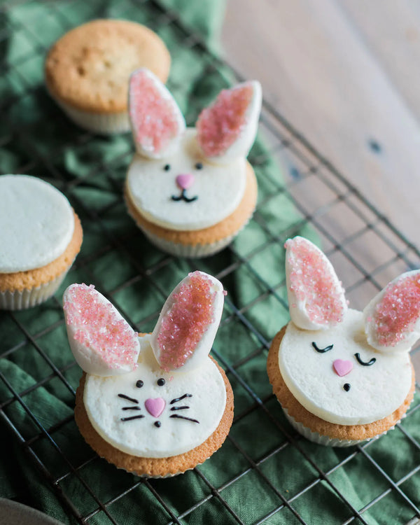 Honeywell Bakes Bunny Cupcake Baking Kit - cupcakes iced to look like bunnies on a cooling rack