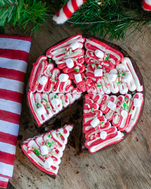 Honeywell Bakes Young Bakers Subscription, A festive cake decorated with candy cane icing