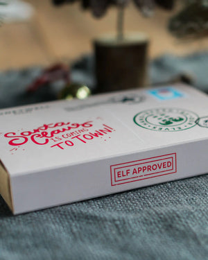 Honeywell Bakes Christmas Postcard Biscuit gift packaging with stamped detail