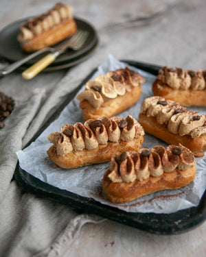 Honeywell Bakes Coffee Eclair Baking Kit - Eclairs with coffee cream on a marble surface