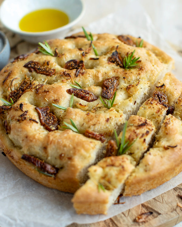Honeywell Bakes Bread Bakers Subscription, A freshly baked focaccia bread with figs, sunflower seeds and rosemary