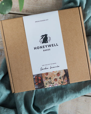 Honeywell Bakes Garden Focaccia Bread Baking Kit packaging on a wooden surface with blue fabric