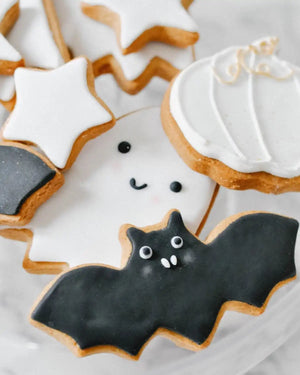 Honeywell Bakes Halloween Biscuit Gift Set - Halloween-themed cookies including a bat, ghost, and pumpkin on a white background