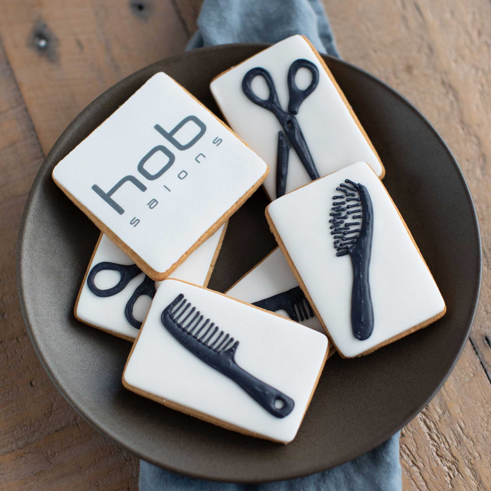 Hand iced hairdressing themed branded biscuits for Hob Salons by Honeywell Bakes