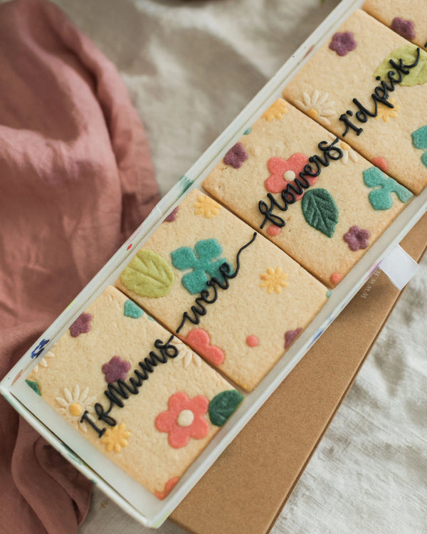 Honeywell Bakes If Mums Were Flowers Biscuit Gift Set - Decorative cookies with floral designs and text in a box