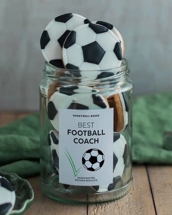 Honeywell Bakes Jar of Football Biscuits - Cookies shaped like footballs in a jar with a 'Best Football Coach' label.