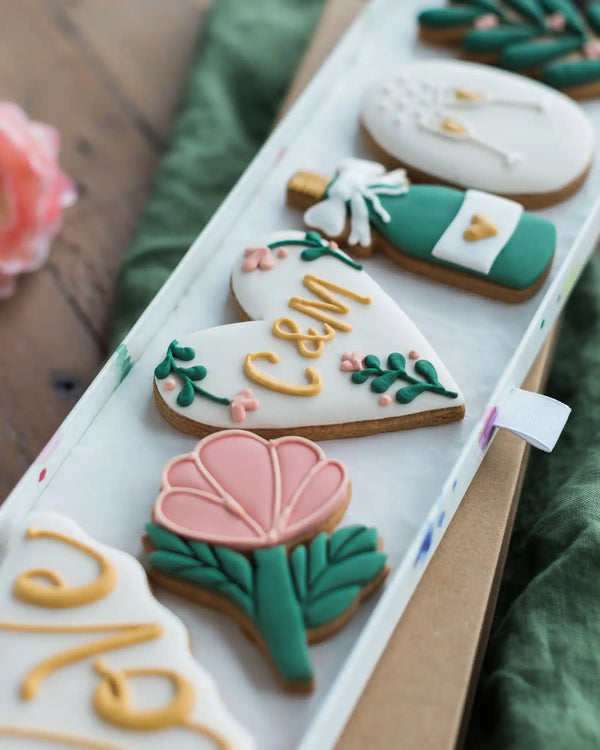 Honeywell Bakes Large Lovely Couple Biscuit Gift Set - Decorative cookies with floral and text designs on a white tray.