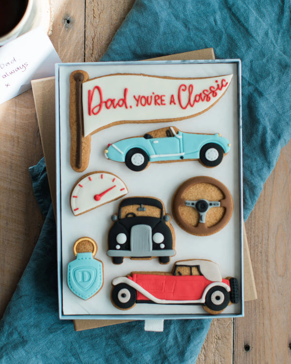 Honeywell Bakes Large You’re A Classic Biscuit Gift - Vintage car-themed cookies on a wooden surface