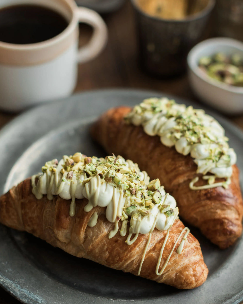 Honeywell Bakes Make Your Own Pistachio Croissant Baking Kit - Croissants with pistachio buttercream filling on a baking tray