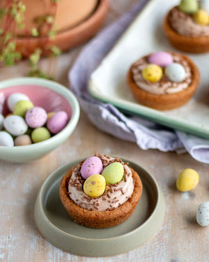Honeywell Bakes Young Bakers Subscription, Chocolate chip cookie cups with chocolate icing and pastel chocolate eggs