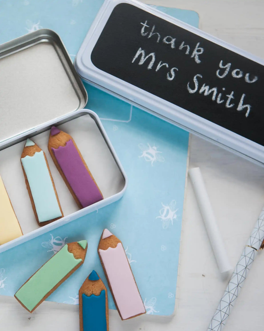 Honeywell Bakes Personalised Biscuit Pencils in Pencil Tin - Decorative cookies shaped like pencils with personalised text in a tin box.