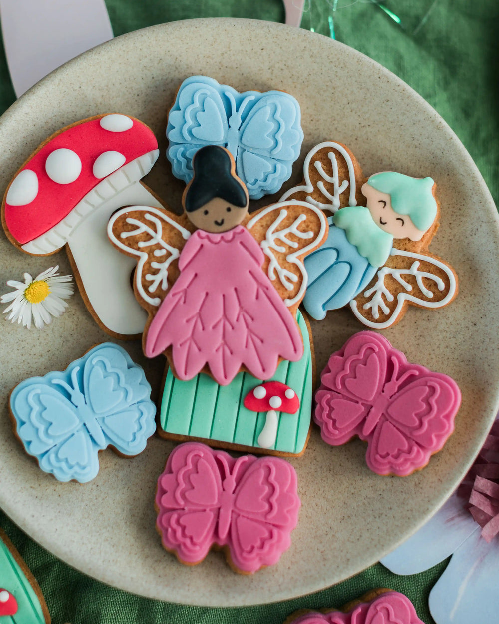 Honeywell Bakes Personalised Fairy Garden Biscuit Jar - Jar of 'Jessica's Fairy Biscuits' with decorative cookies on a green surface.