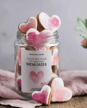 Honeywell Bakes Personalised Jar of Heart Biscuits - Jar of heart-shaped cookies with a 'Honeywell Bakes' label on a soft background
