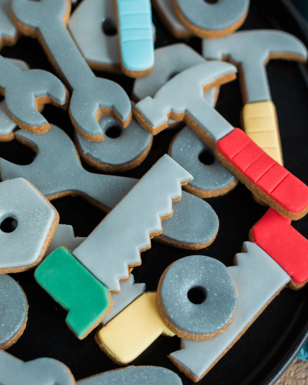 Honeywell Bakes Personalised Jar of Tools - Jar of cookie tools with a birthday message on a blue fabric background