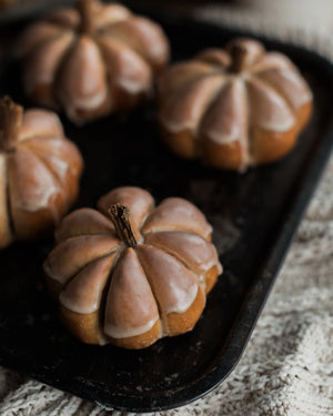 Honeywell Bakes Pumpkin Spiced Iced Bun Baking Kit - Decorative pumpkins with a glaze on a baking tray