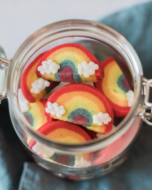 Honeywell Bakes Rainbow Biscuit Baking Kit - Glass jar filled with colourful rainbow-shaped cookies on a light background