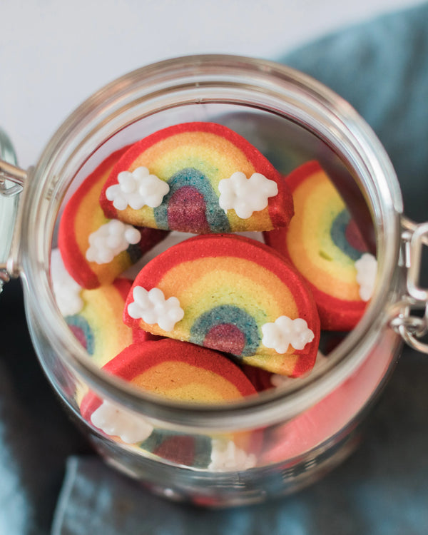 Honeywell Bakes Rainbow Biscuit Baking Kit - Glass jar filled with colourful rainbow-shaped cookies on a light background