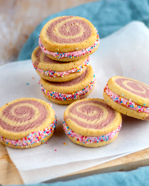 Honeywell Bakes Young Bakers Subscription, swirled sandwich cookies with pink filling and colourful sprinkles