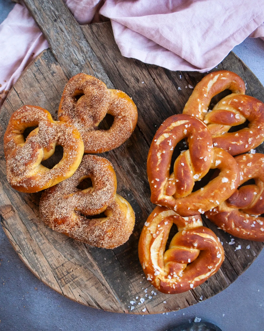 Honeywell Bakes Sweet or Savoury Heart Pretzel Baking Kit - A selection of pretzels arranged on a wooden board