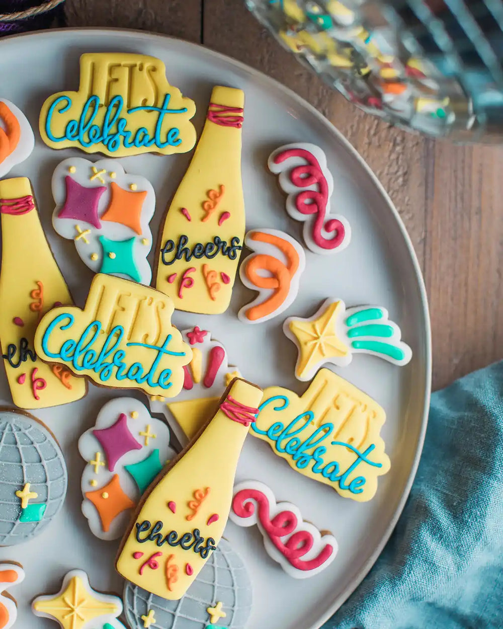 Honeywell Bakes The Celebration Jar - Decorative cookies in a jar with a 'Let's Celebrate!' tag on a wooden surface.