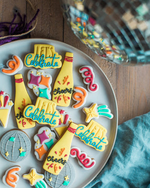 Honeywell Bakes The Celebration Jar - Decorative cookies with celebratory text on a plate