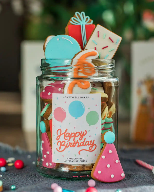 Honeywell Bakes The Happy Birthday Biscuit Jar - Jar of handcrafted artisian biscuits with decorative cookies and a 'Happy Birthday' label.