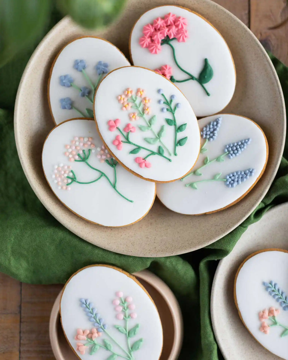 Honeywell Bakes Wildflower Biscuit Gift Set - Decorative cookies with floral designs on a plate.