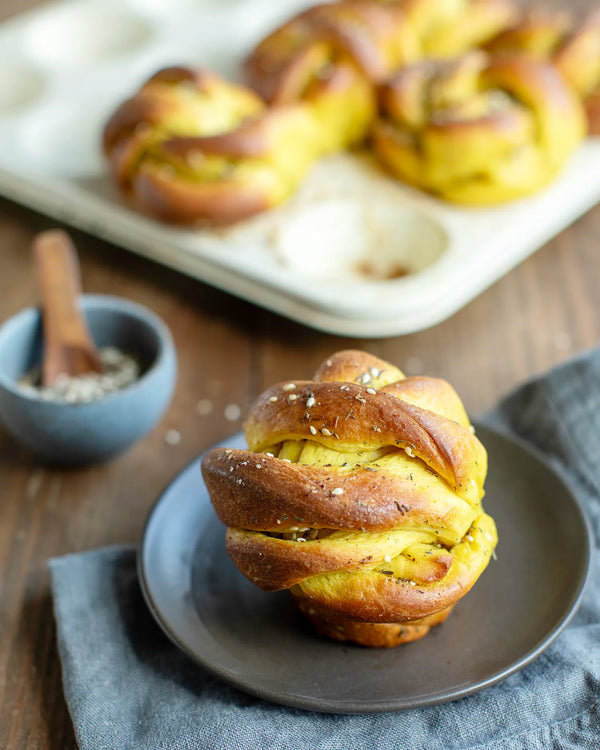 Honeywell Bakes Bread Bakers Subscription, A braided bread roll with sesame seeds 
