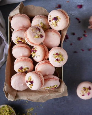 Honeywell Bakes Family Bakers Subscription, Box of pink macarons with pistachio pieces